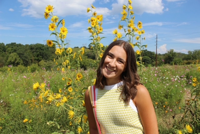 Ashlyn in field of flowers