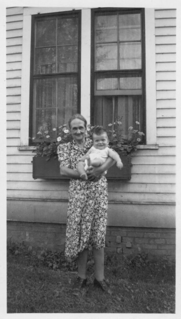 grandmother holding baby boy